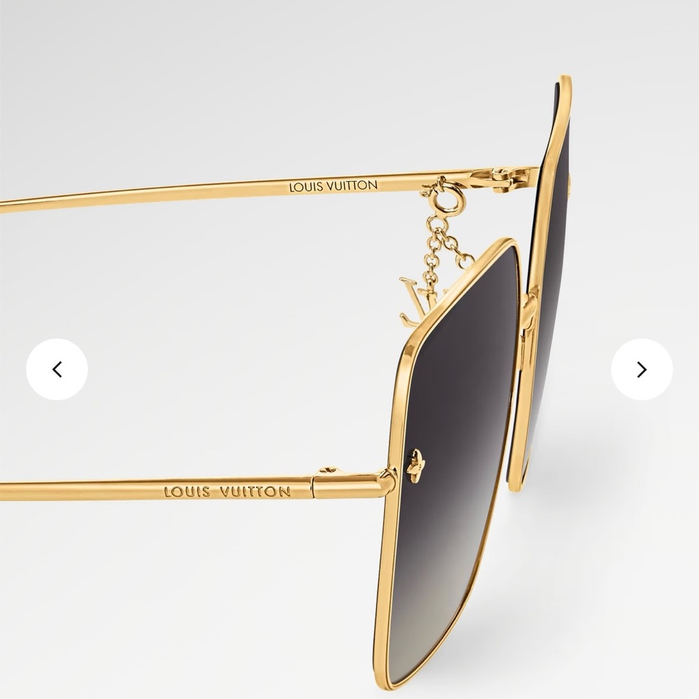 Louis Vuitton Gold and Black Cat Eye Sunglasses
With beautiful little charm . - Picture 8 of 9